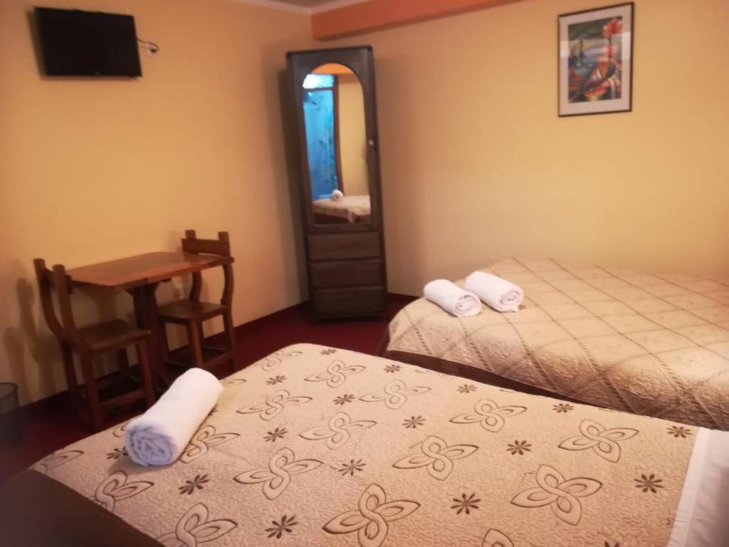 Voodi või voodid majutusasutuse HOSTAL MILAGROS INN - samary inn toas