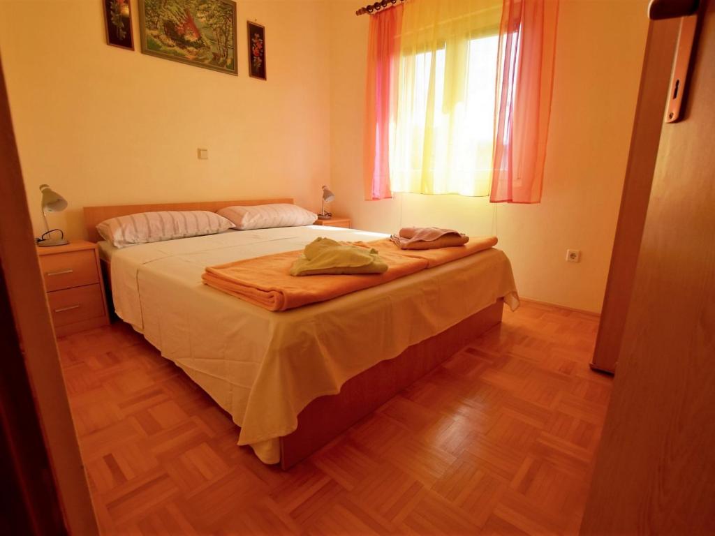 Postel nebo postele na pokoji v ubytování Apartments Pinka