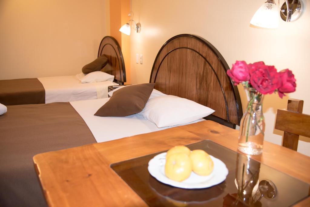 Voodi või voodid majutusasutuse HOSTAL MILAGROS INN - samary inn toas