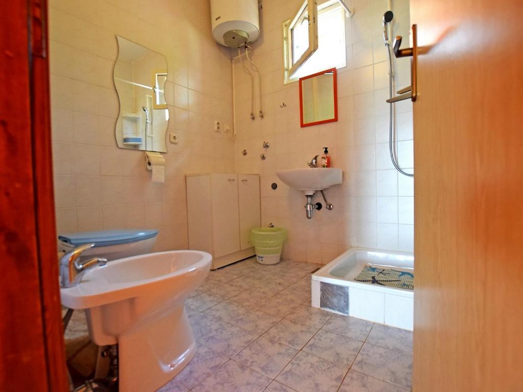 Koupelna v ubytování Apartments Pinka