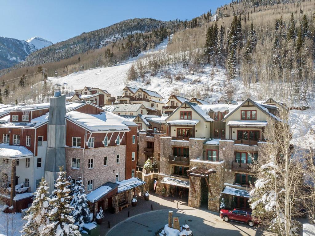 an aerial view of a resort in the snow at The Auberge Residences at Element 52 in Telluride