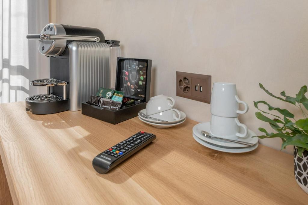Příslušenství pro přípravu čaje a kávy v ubytování Hotel Heimatlodge