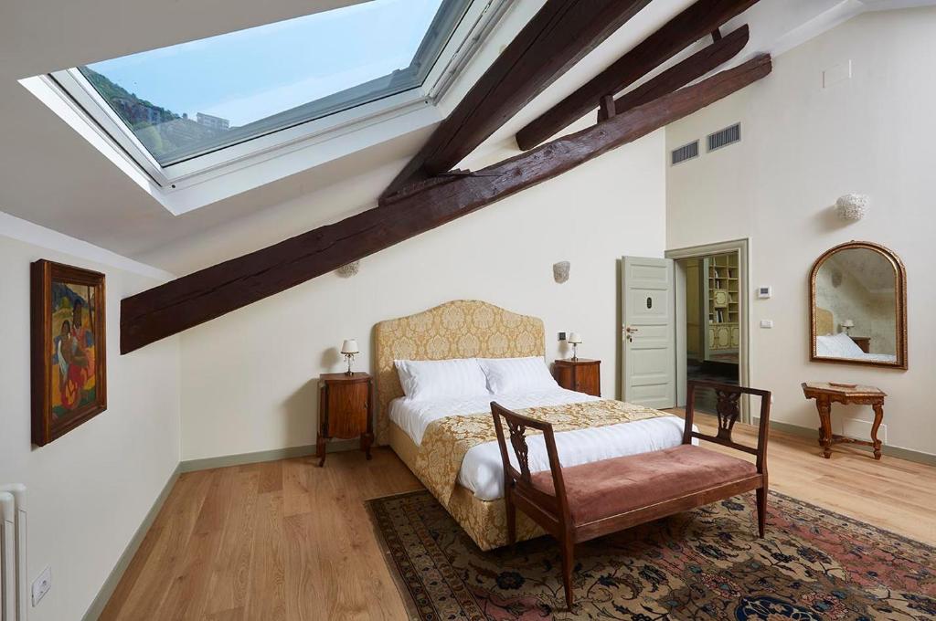 Postel nebo postele na pokoji v ubytování Villa Platamone