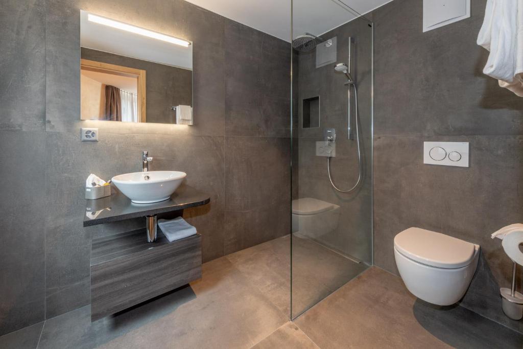 Koupelna v ubytování Hotel Heimatlodge