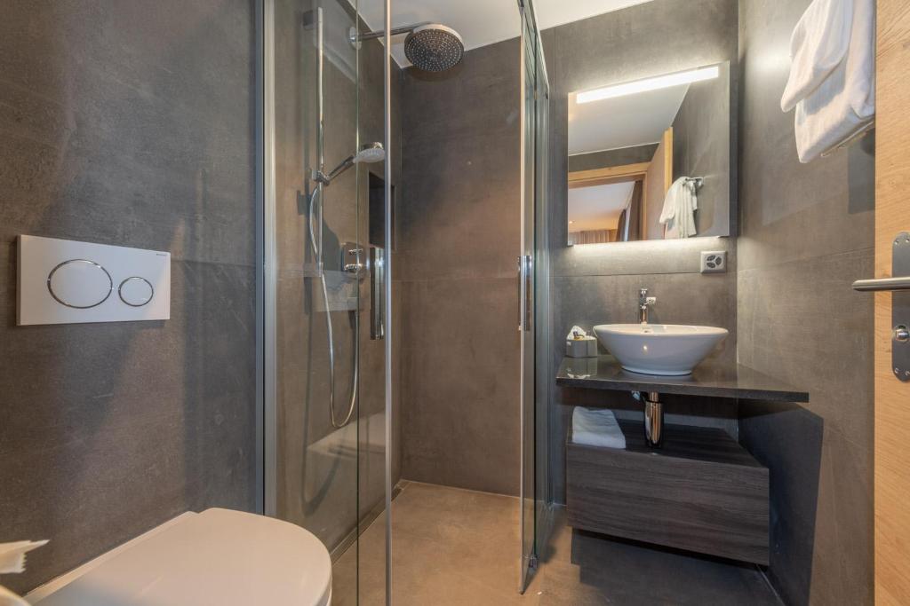 Koupelna v ubytování Hotel Heimatlodge