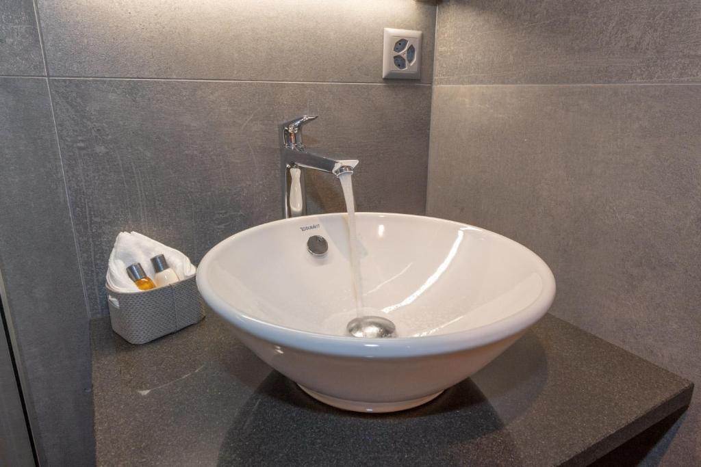 Koupelna v ubytování Hotel Heimatlodge