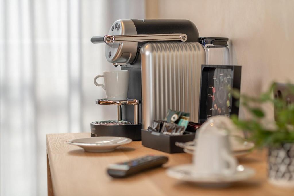 Příslušenství pro přípravu čaje a kávy v ubytování Hotel Heimatlodge
