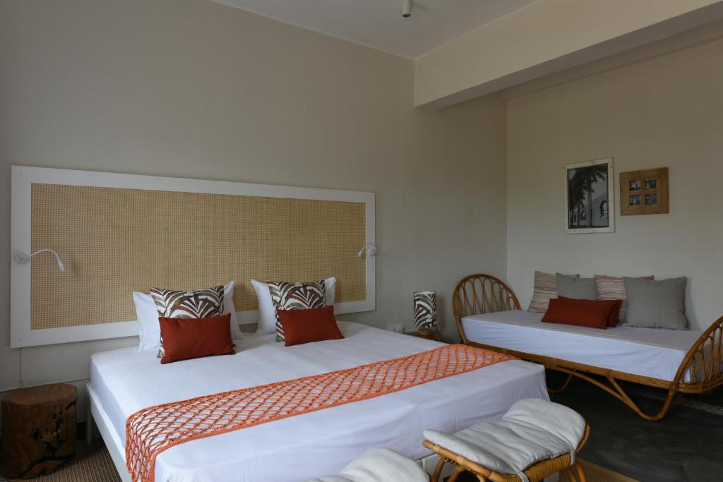 Postel nebo postele na pokoji v ubytování Kaz'alala Hosted B&B