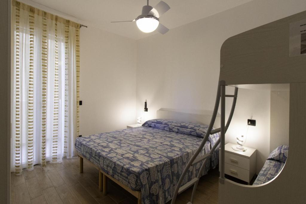Postel nebo postele na pokoji v ubytování Le Primule