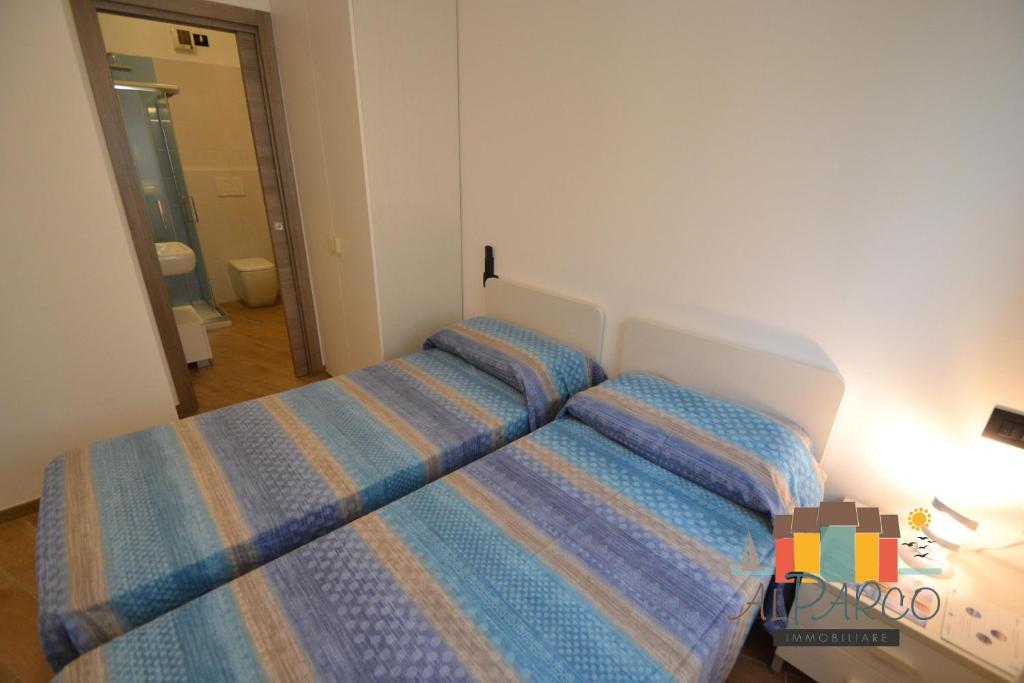 Postel nebo postele na pokoji v ubytování Le Primule