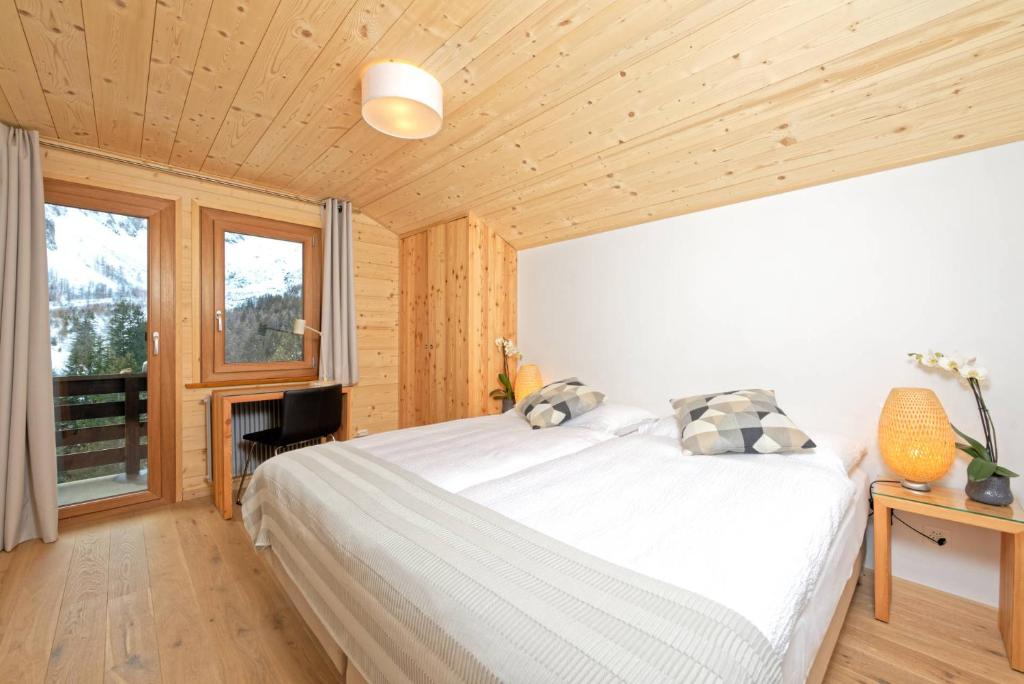 Postel nebo postele na pokoji v ubytování Hotel Edelweiss