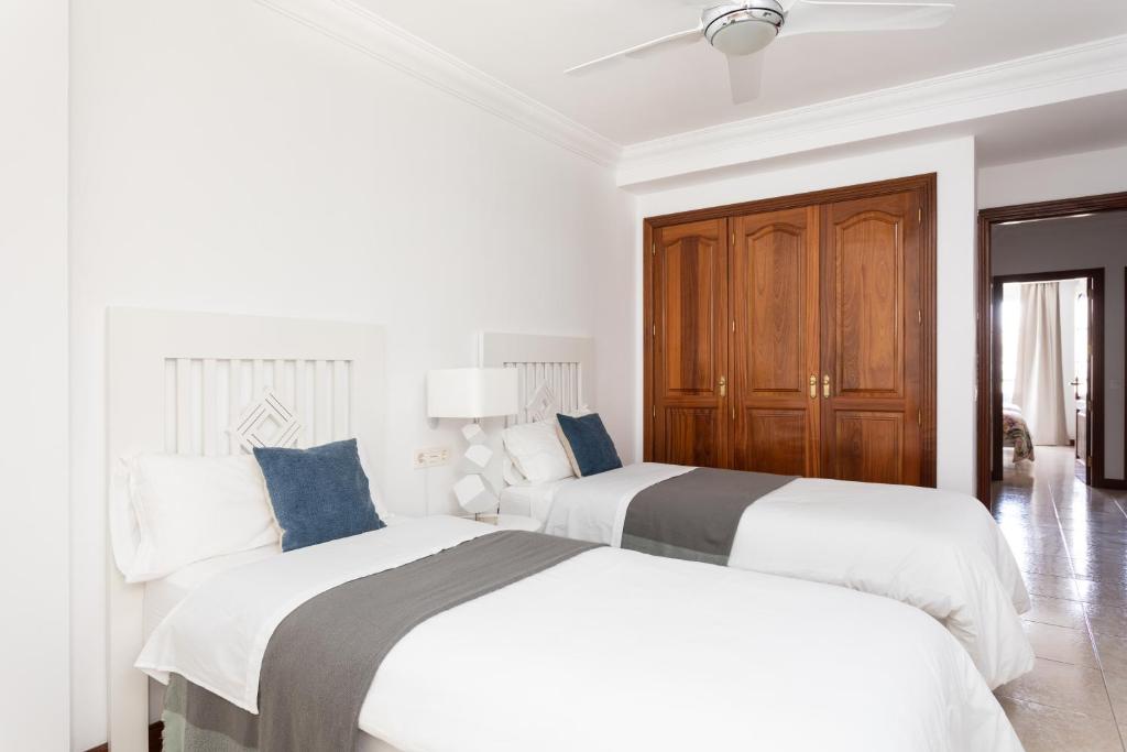 Postel nebo postele na pokoji v ubytování Rooms & Suites Balcony 3C