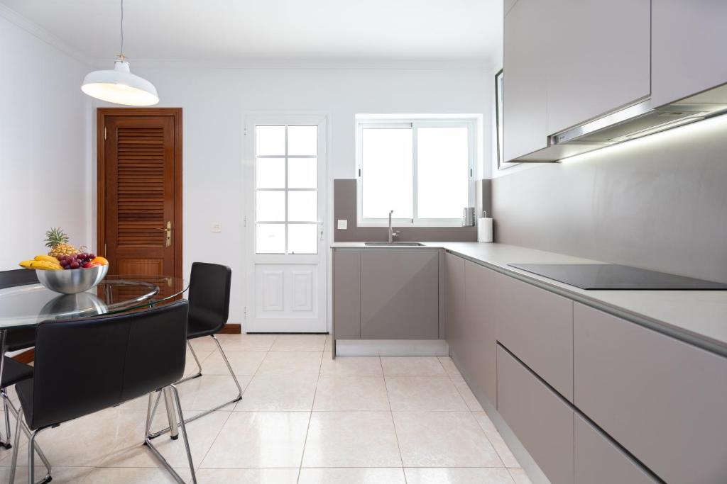 Kuchyň nebo kuchyňský kout v ubytování Rooms & Suites Balcony 3C