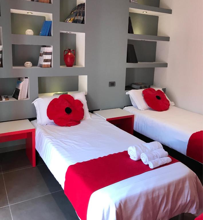 Postel nebo postele na pokoji v ubytování Hotel Rimini Tirana
