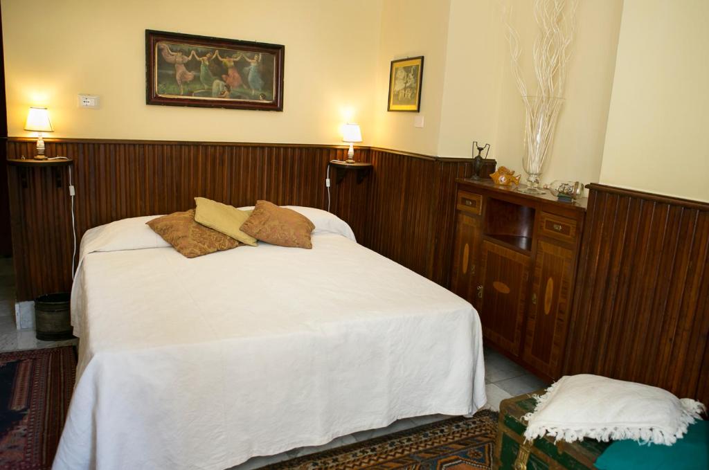 A bed or beds in a room at B&B Santa Caterina