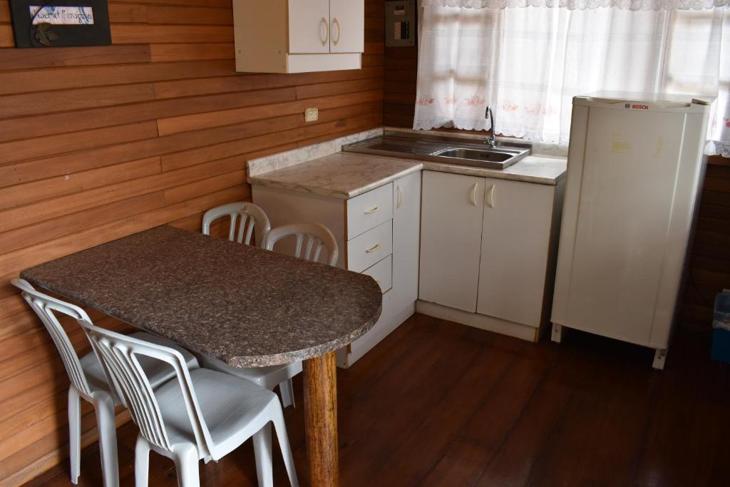 Kuchyň nebo kuchyňský kout v ubytování Hosteria Palmetto