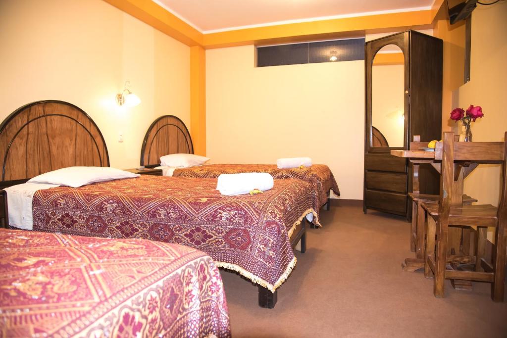Voodi või voodid majutusasutuse HOSTAL MILAGROS INN - samary inn toas