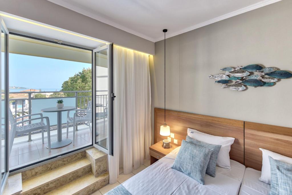 Vuode tai vuoteita majoituspaikassa Contessa Hotel