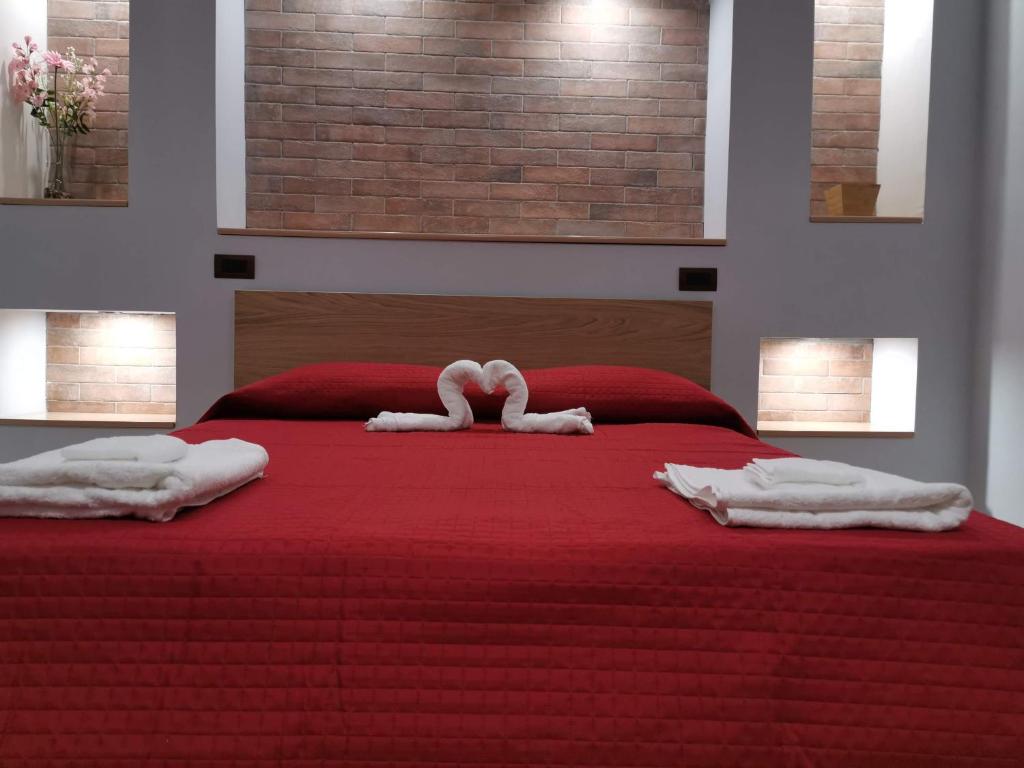 Postel nebo postele na pokoji v ubytování Bed and Breakfast Picentia 19