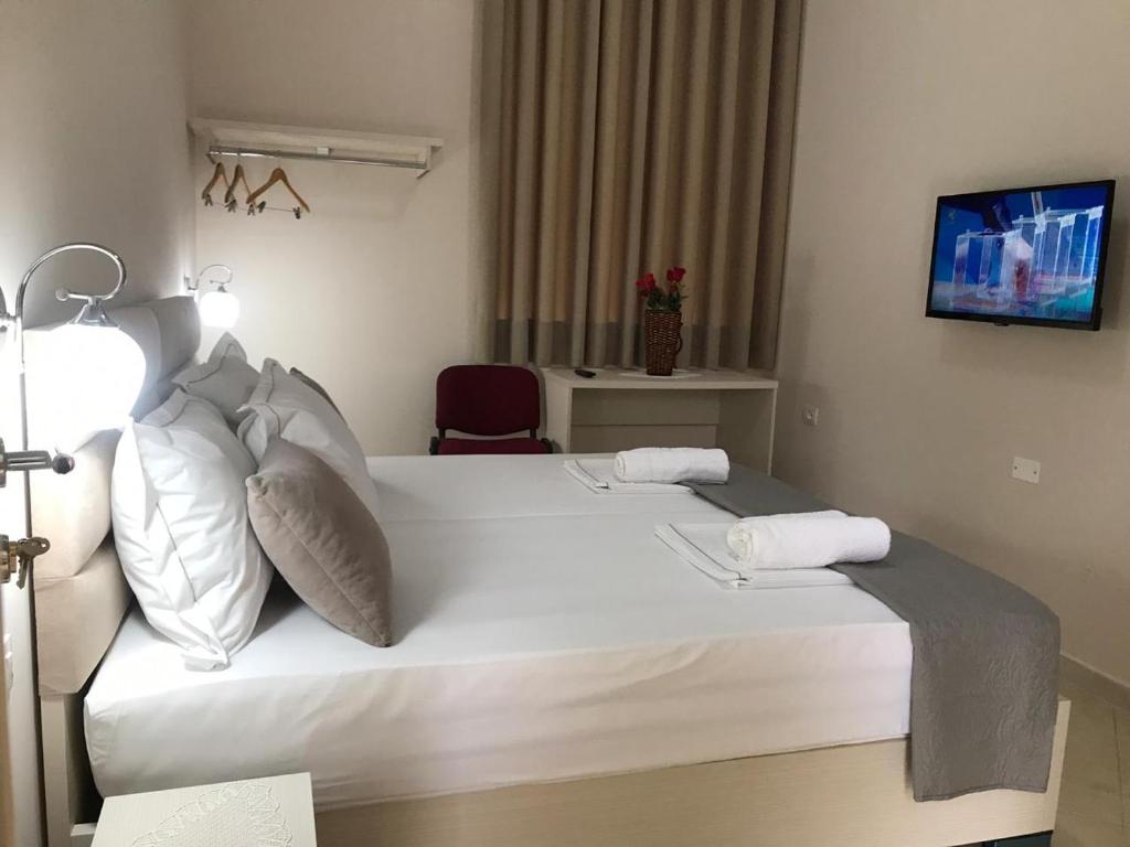 Llit o llits en una habitació de Olive B&B