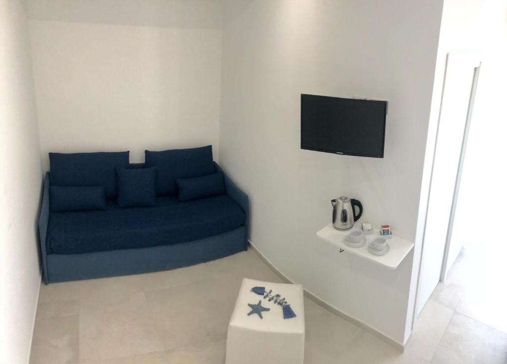 TV a/nebo společenská místnost v ubytování Accanto a te - Charme Rooms