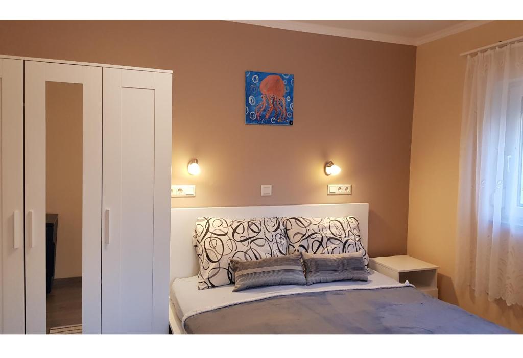 A bed or beds in a room at TimiBá