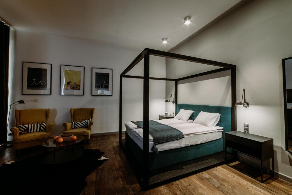 Posteľ alebo postele v izbe v ubytovaní BIKE ROOMS