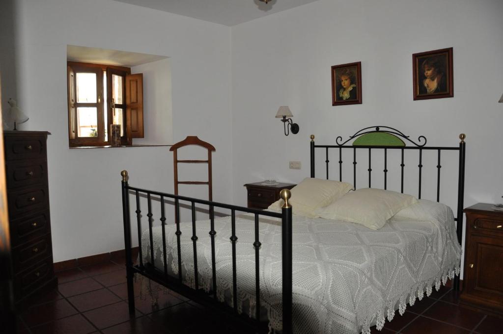 Postel nebo postele na pokoji v ubytování Posada la Torre