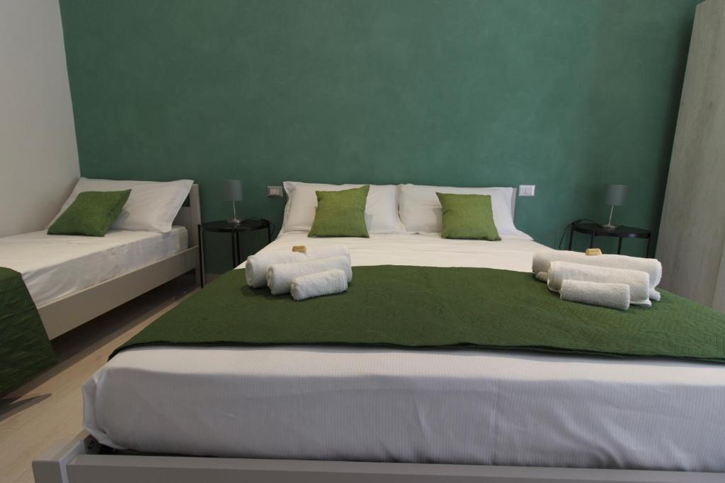 Postel nebo postele na pokoji v ubytování Il sentiero dell'Itria - Camere con vista