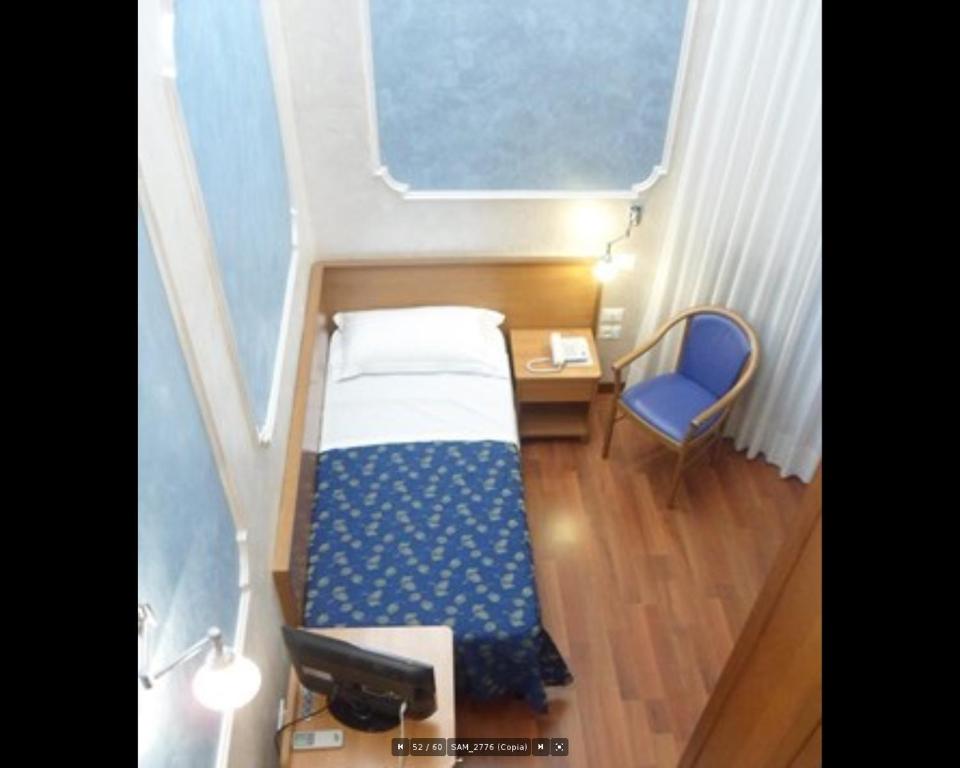 Posteľ alebo postele v izbe v ubytovaní Hotel Alba