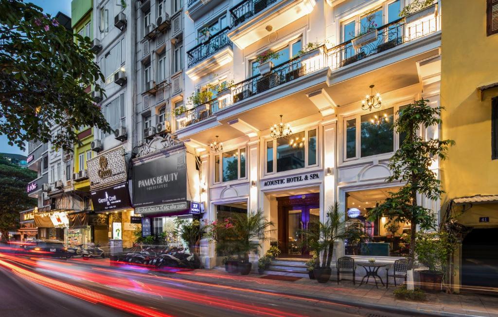 a city street filled with lots of tall buildings at Acoustic Hotel & Spa in Hanoi