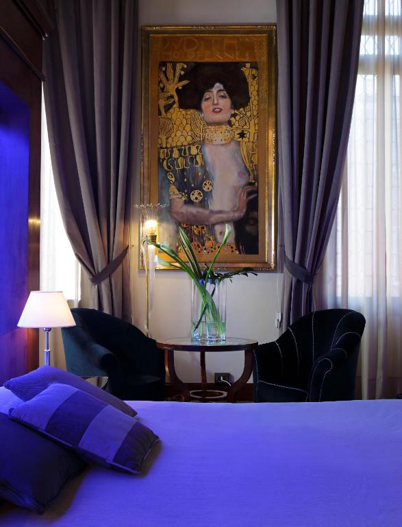 Postel nebo postele na pokoji v ubytování Hotel Liassidi Palace