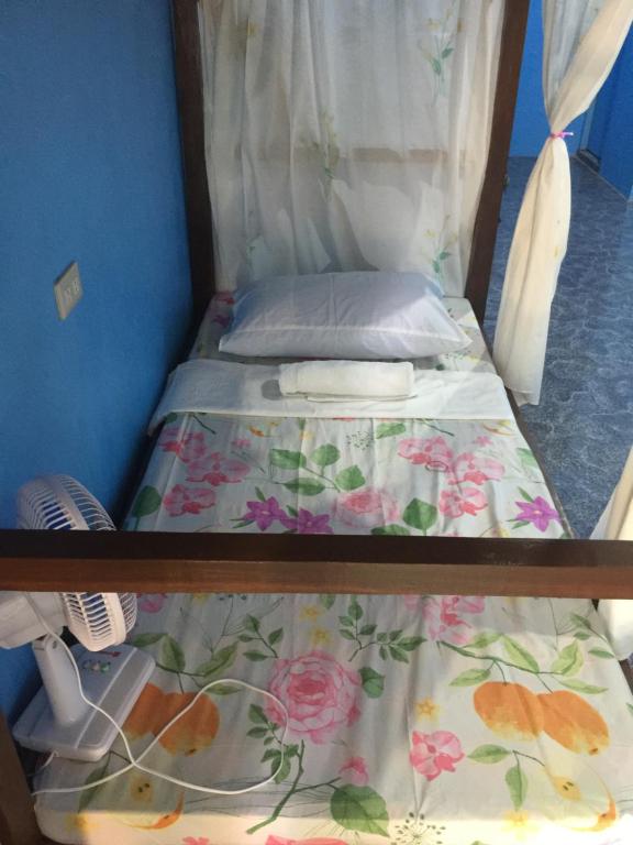 Postel nebo postele na pokoji v ubytování Carillo guest house