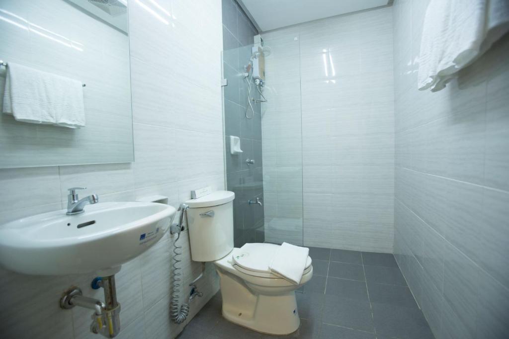 Koupelna v ubytování The Lanang Suites