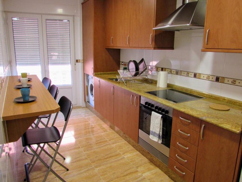 Kuchyň nebo kuchyňský kout v ubytování Apartamento en centro de Fisterra
