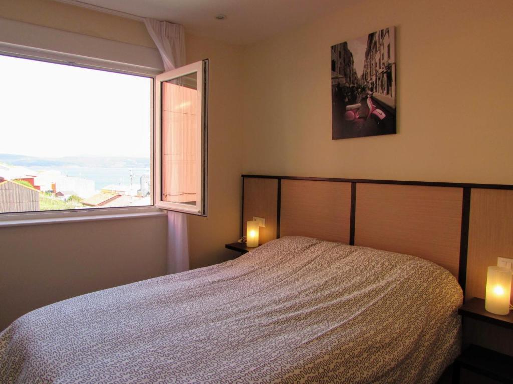 Postel nebo postele na pokoji v ubytování Apartamento en centro de Fisterra