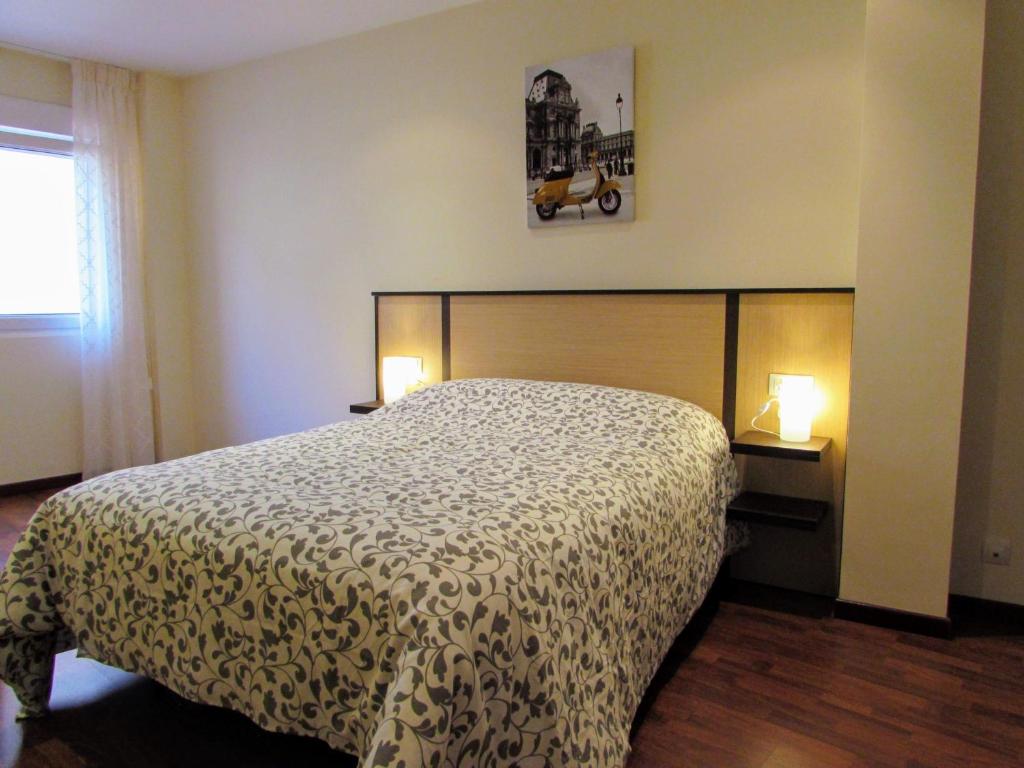 Postel nebo postele na pokoji v ubytování Apartamento en centro de Fisterra