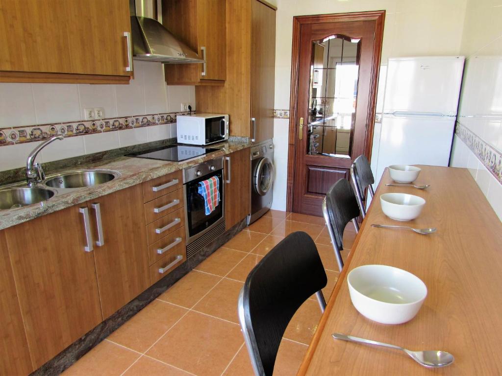 Kuchyň nebo kuchyňský kout v ubytování Apartamento en centro de Fisterra