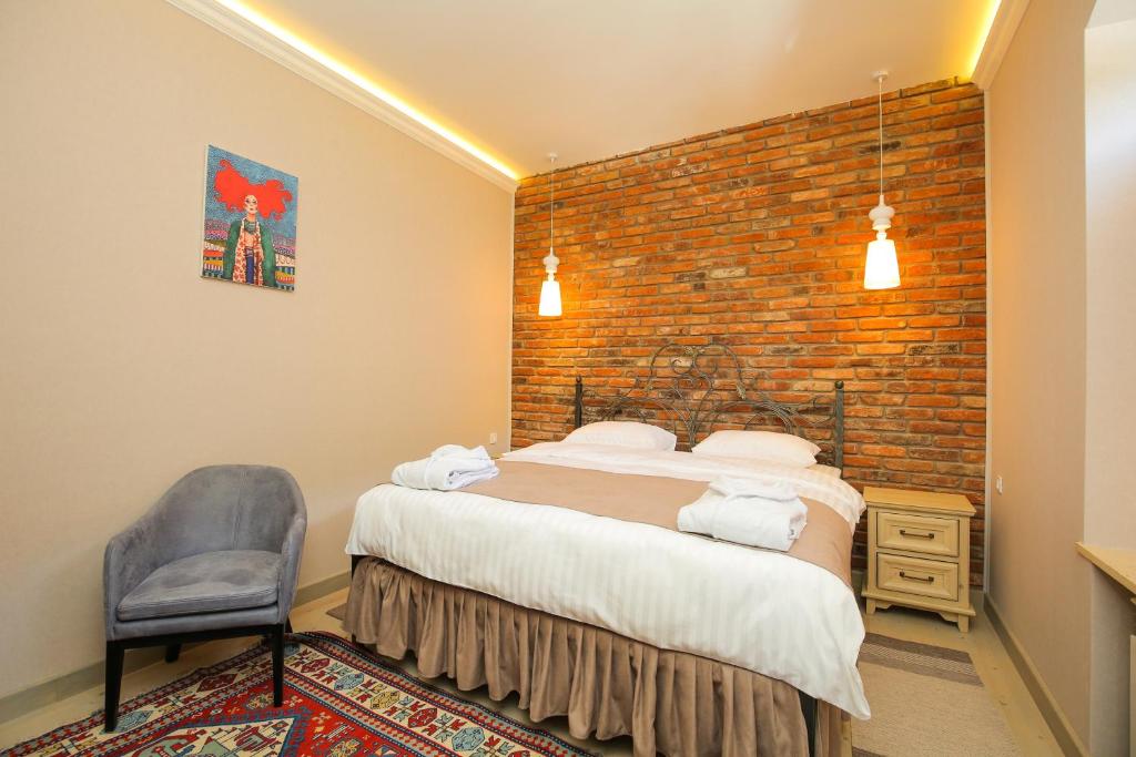 Postel nebo postele na pokoji v ubytování CHALET DILIJAN Hotel & Restauarant
