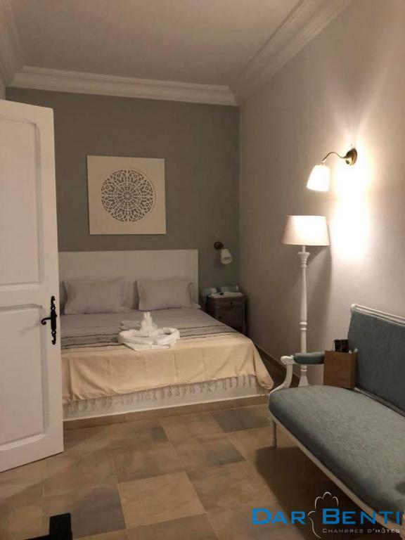 Postel nebo postele na pokoji v ubytování Dar Benti