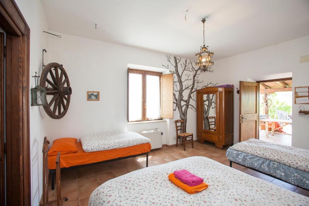 Vuode tai vuoteita majoituspaikassa Italyfarmstay