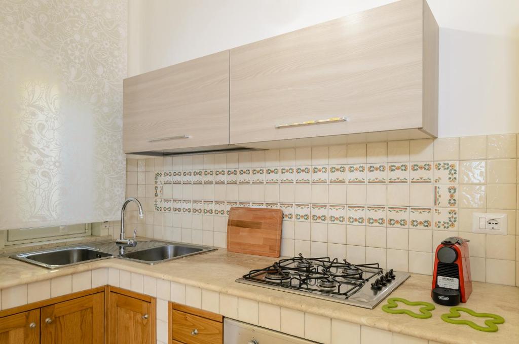 Kuchyňa alebo kuchynka v ubytovaní Sunset Holiday Home Taormina