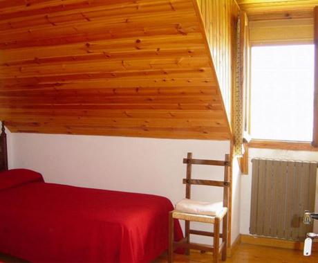 Postel nebo postele na pokoji v ubytování Pensión Pallaruelo