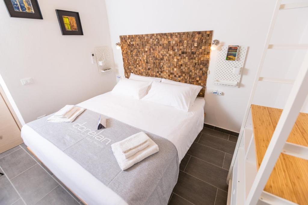Łóżko lub łóżka w pokoju w obiekcie Mosina Apartments