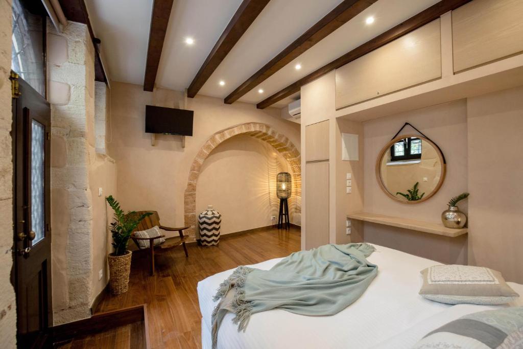 Posteľ alebo postele v izbe v ubytovaní J&G Suites