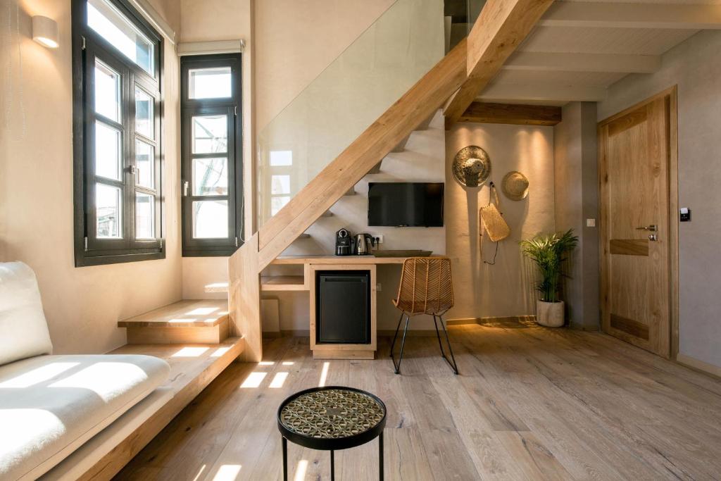 Posteľ alebo postele v izbe v ubytovaní J&G Suites