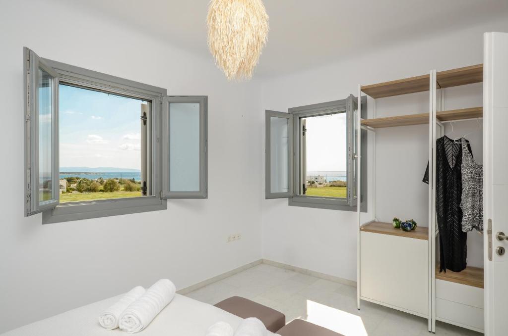 Postel nebo postele na pokoji v ubytování Villa Tranquillity