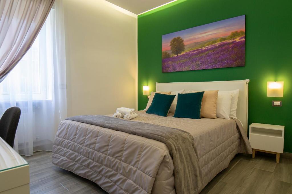 Posteľ alebo postele v izbe v ubytovaní B&B Maremy... I 4 Elementi