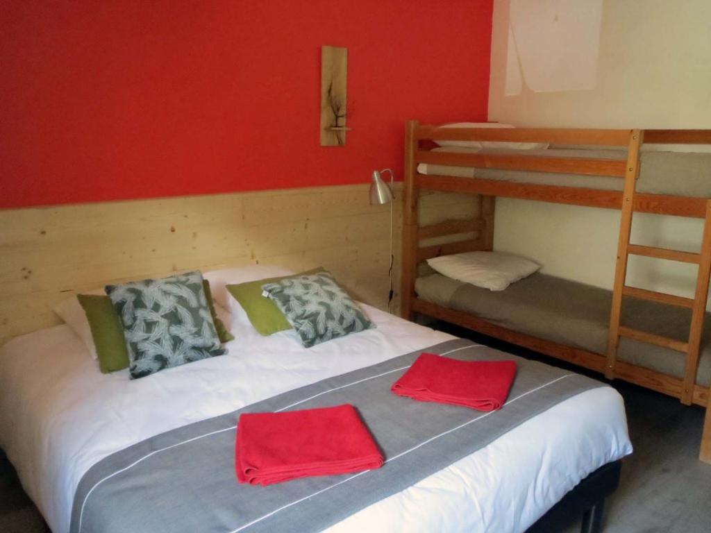 Postel nebo postele na pokoji v ubytování AUBERGE GAILLARD