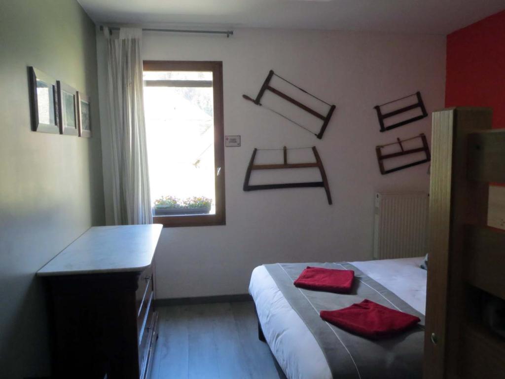 Postel nebo postele na pokoji v ubytování AUBERGE GAILLARD